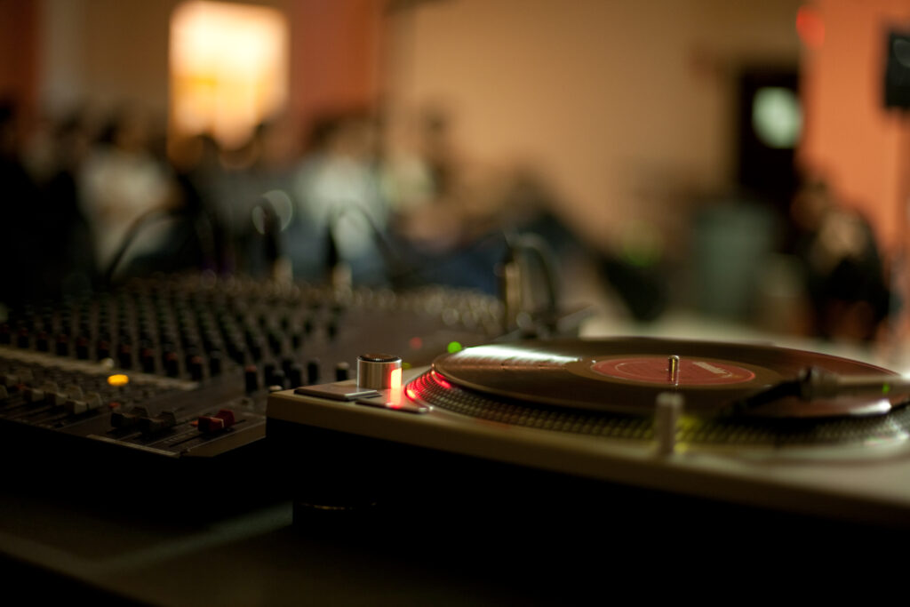 A close-up shot of a turntable playing a record.