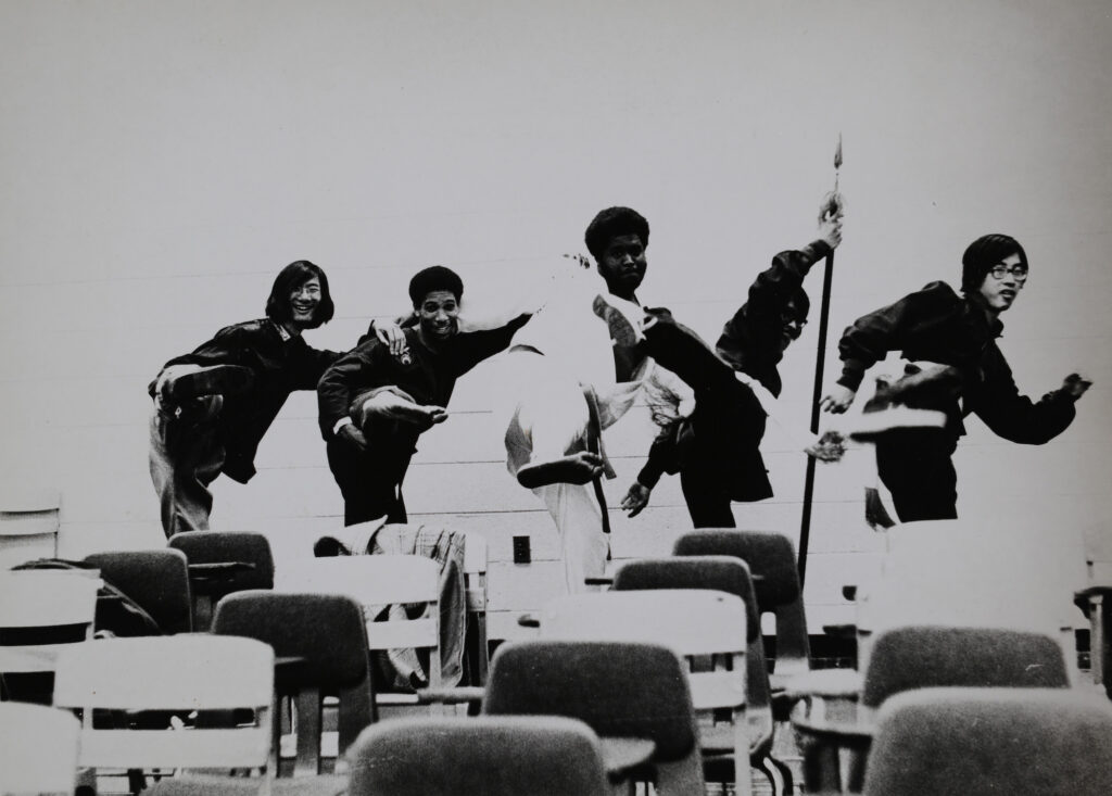 Black and white photo of Harry Lee Chow and friends.